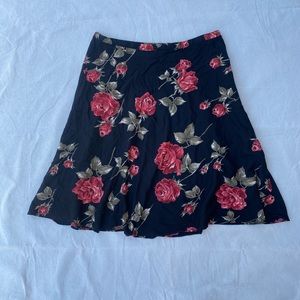 Express skirt black with red roses size Medium